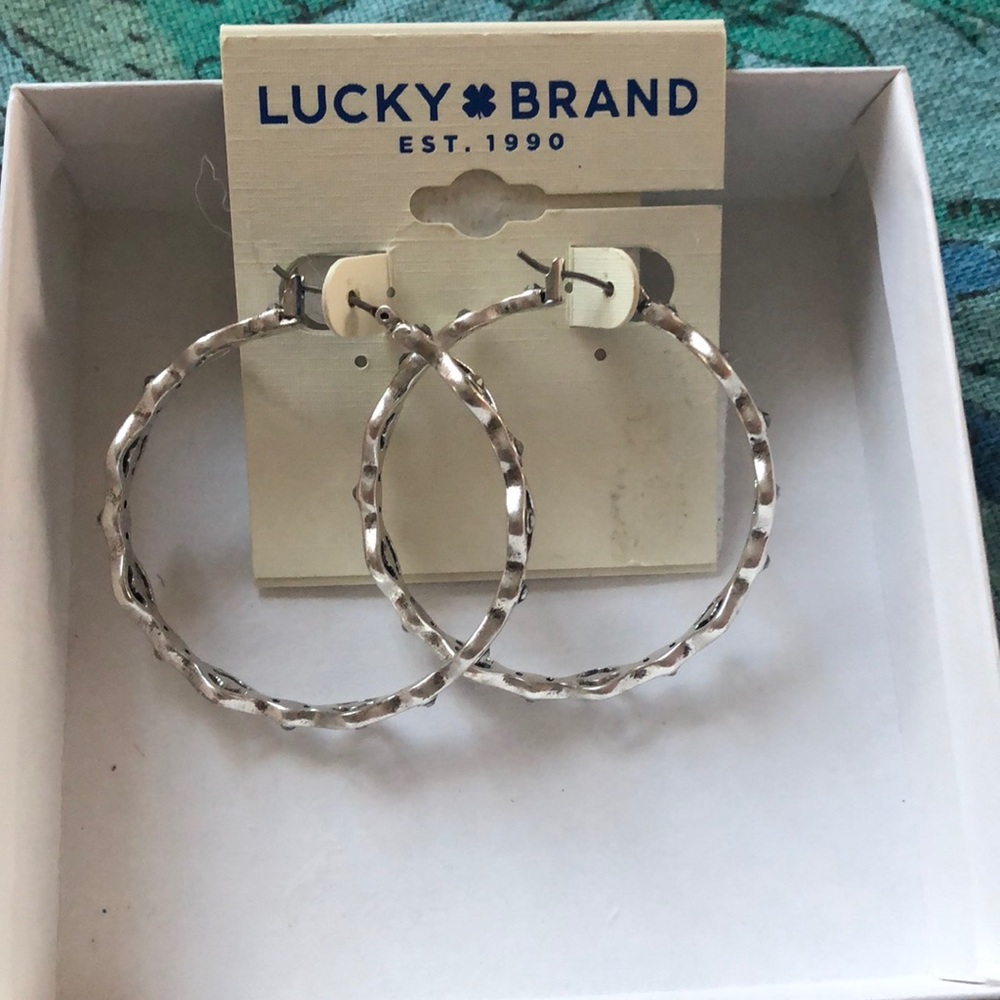 Silver hoop earrings with diamond bead detail